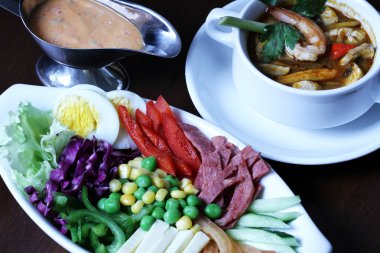 Vegetable salad with mayonnaise and yummy tomyam