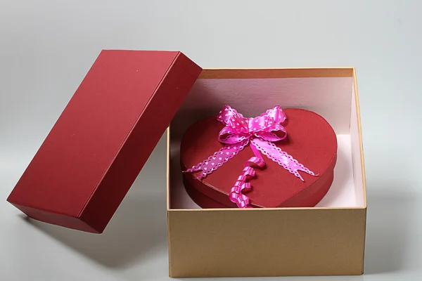 Valentine ribbon box inside square box, white back ground — Stock Photo, Image