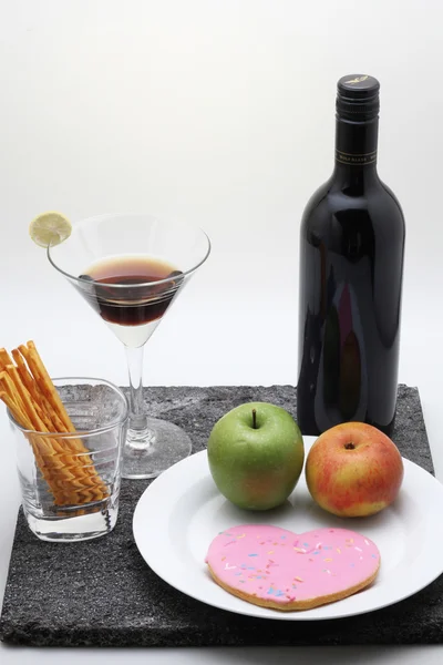 Rotwein, Äpfel und Keksstange — Stockfoto