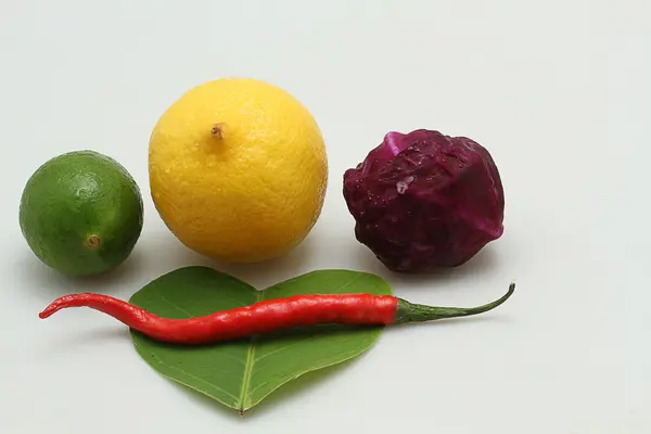 Orange,lemon,chili and red cabbage, isolated on white background — Stock Photo, Image