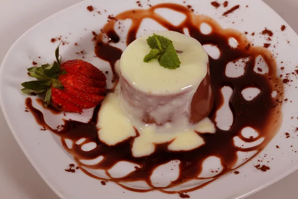 Chocolate pudding with sauce — Stock Photo, Image