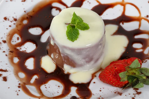 Chocolate pudding with sauce — Stock Photo, Image