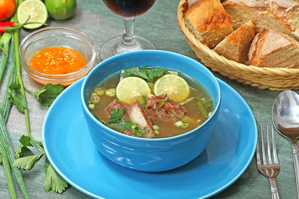 Food: ribs soup, cakes, beef satay — Stock Image Food: ribs soup, cakes, beef satay Stock Photo