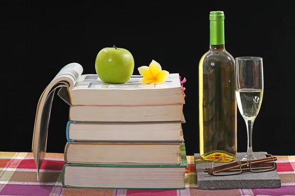 Stack of books, isolated on black and white — Stock Photo, Image