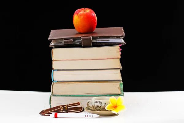 Stack of books, isolated on black and white — Stock Photo, Image