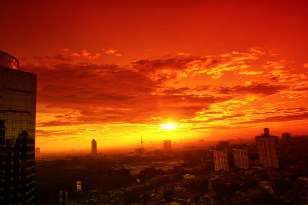 Sunset over the city — Stock Photo, Image