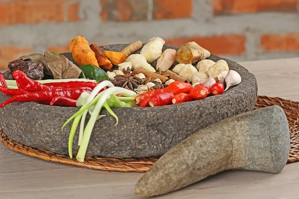 Spices on mortar — Stock Photo, Image