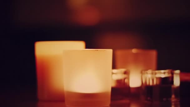 Holiday mood, burning candles at night, relaxing atmosphere — Stock video
