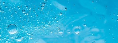 Mavi su dokusu su arka planı, doğa ve bilim konsepti, cilt kozmetik ürünleri ve hijyen makrosu kapanışı