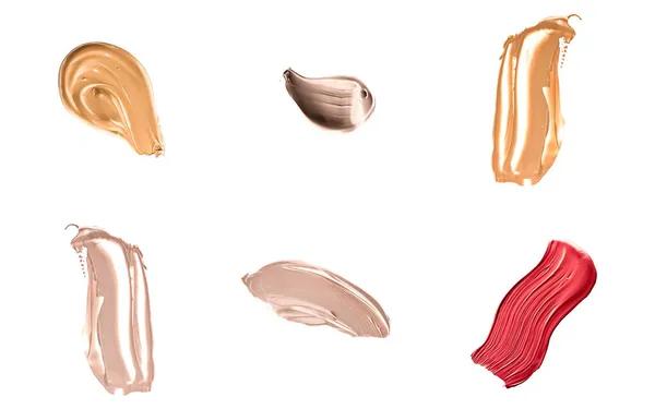 Set von Pinselstrichen oder kosmetischen Make-up-Proben isoliert auf weißem Hintergrund — Stockfoto