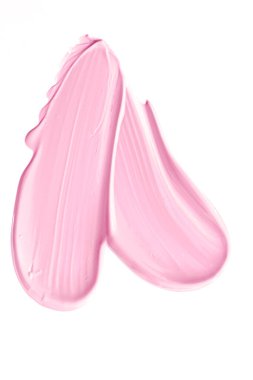 Beyaz arkaplanda yalıtılmış pembe güzellik kozmetik dokusu, lekeli makyaj kremi lekesi veya temel lekesi, kozmetik ürün ve boya vuruşları.