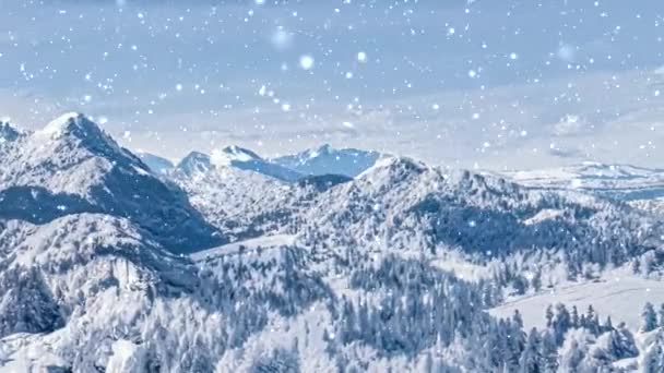 Winter wonderland and snowing Christmas landscape. Snowfall in mountains and forest covered with snow as holiday background — Stock Video