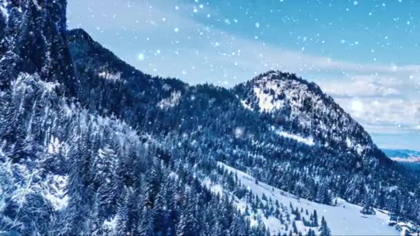 Winter wonderland and snowing Christmas landscape. Snowfall in mountains and forest covered with snow as holiday background — Stock Video