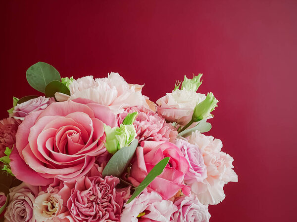 Beautiful flower box on red background, bouquet of blooming flowers as holiday gift, luxury floral design concept