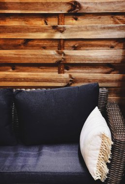 Garden furniture design detail, outdoor sofa and cushions as home decor and patio or terrace interior concept