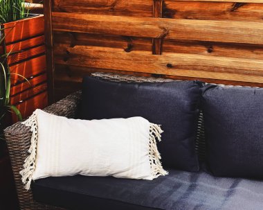 Garden furniture design detail, outdoor sofa and cushions as home decor and patio or terrace interior concept