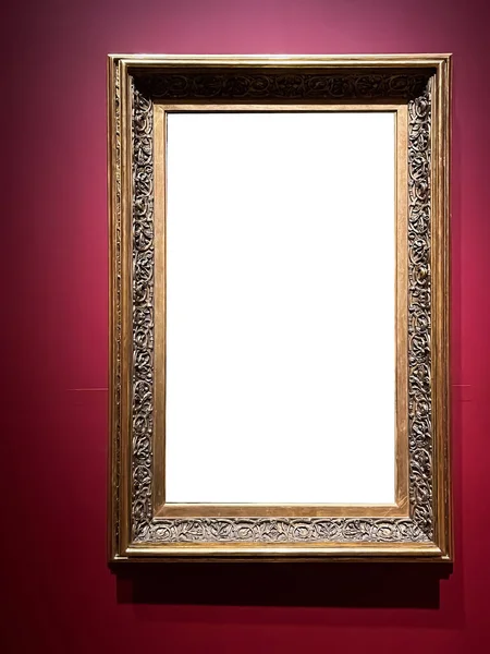 Antique golden art fair gallery frame on the wall at auction house or museum exhibition, blank template with empty white copyspace for mockup design, artwork concept