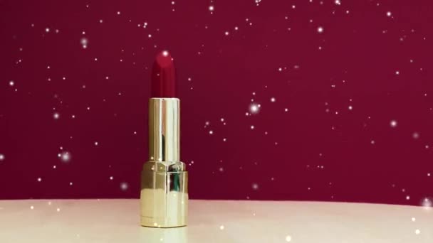 圣诞期间 红色口红作为奢侈的化妆品和雪地 化装雪地广告和美的品牌形象 — 图库视频影像