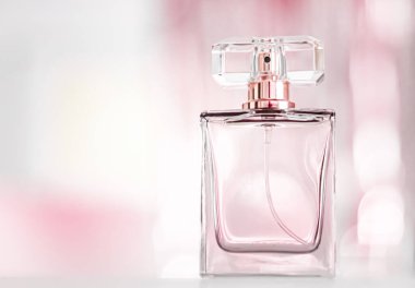 Perfume bottle on glamour background, floral feminine scent, fragrance and eau de parfum as luxury holiday gift, cosmetic and beauty brand present concept