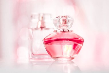 Perfume bottles on glamour background, floral feminine scent, fragrance and eau de parfum as luxury holiday gift, cosmetic and beauty brand present concept