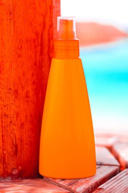 Suntan lotion, spf protection and skin care, sun tan bottle on the beach, beauty and skincare cosmetics product brand