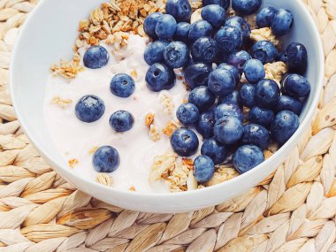 Blueberry yogurt cereal bowl as healthy breakfast and morning meal, sweet food and organic berry fruit, diet and nutrition concept