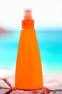 Suntan lotion, spf protection and skin care, sun tan bottle on the beach, beauty and skincare cosmetics product brand