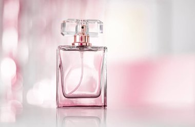 Perfume bottle on glamour background, floral feminine scent, fragrance and eau de parfum as luxury holiday gift, cosmetic and beauty brand present concept clipart
