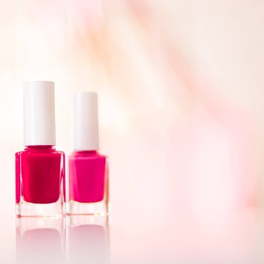 Shades of pink and red nail polish set on glamour background, nailpolish bottles for manicure and pedicure, luxury beauty cosmetics and make-up brand ad