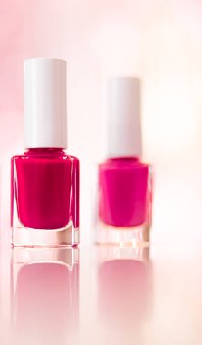 Shades of pink and red nail polish set on glamour background, nailpolish bottles for manicure and pedicure, luxury beauty cosmetics and make-up brand ad