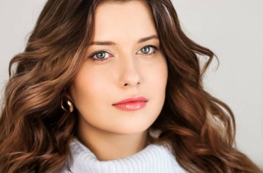 Autumn winter fashion and knitwear, beautiful woman wearing warm knitted scarf, close-up portrait