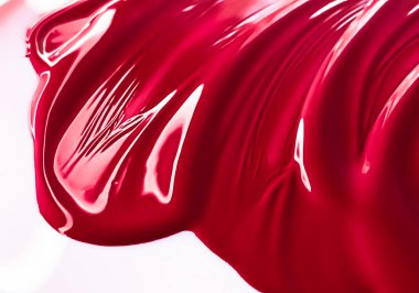 Glossy red cosmetic texture as beauty make-up product background, skincare cosmetics and luxury makeup brand design concept