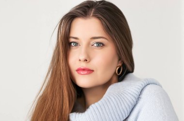 Autumn winter fashion and knitwear, beautiful woman wearing warm knitted sweater, close-up portrait