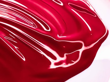 Glossy red cosmetic texture as beauty make-up product background, skincare cosmetics and luxury makeup brand design concept
