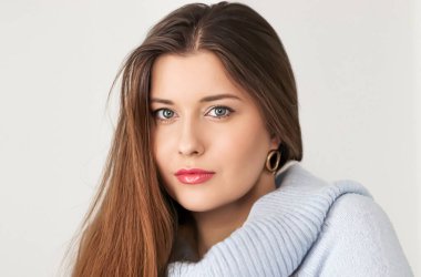 Autumn winter fashion and knitwear, beautiful woman wearing warm knitted sweater, close-up portrait