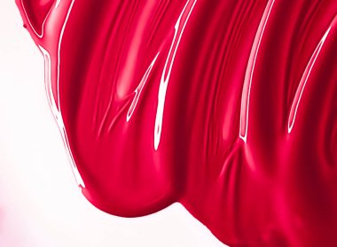Glossy red cosmetic texture as beauty make-up product background, skincare cosmetics and luxury makeup brand design concept