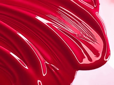 Glossy red cosmetic texture as beauty make-up product background, skincare cosmetics and luxury makeup brand design concept