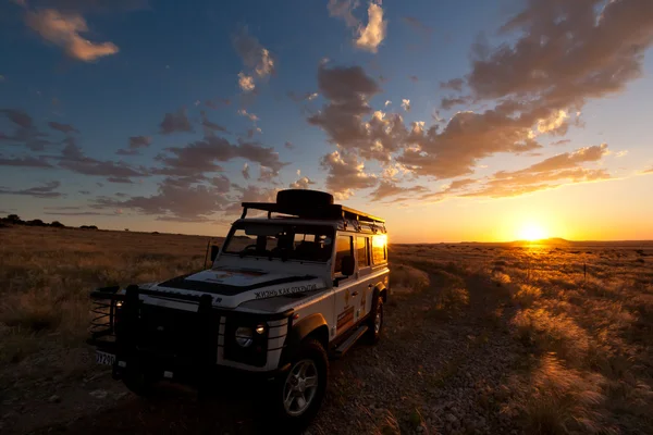 Safari sunset, expedíció, Namíbia — Stock Fotó