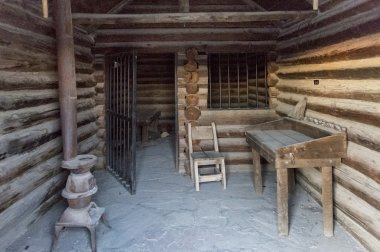 Inside the old western jail in the village of Seligman, Arizona, USA clipart