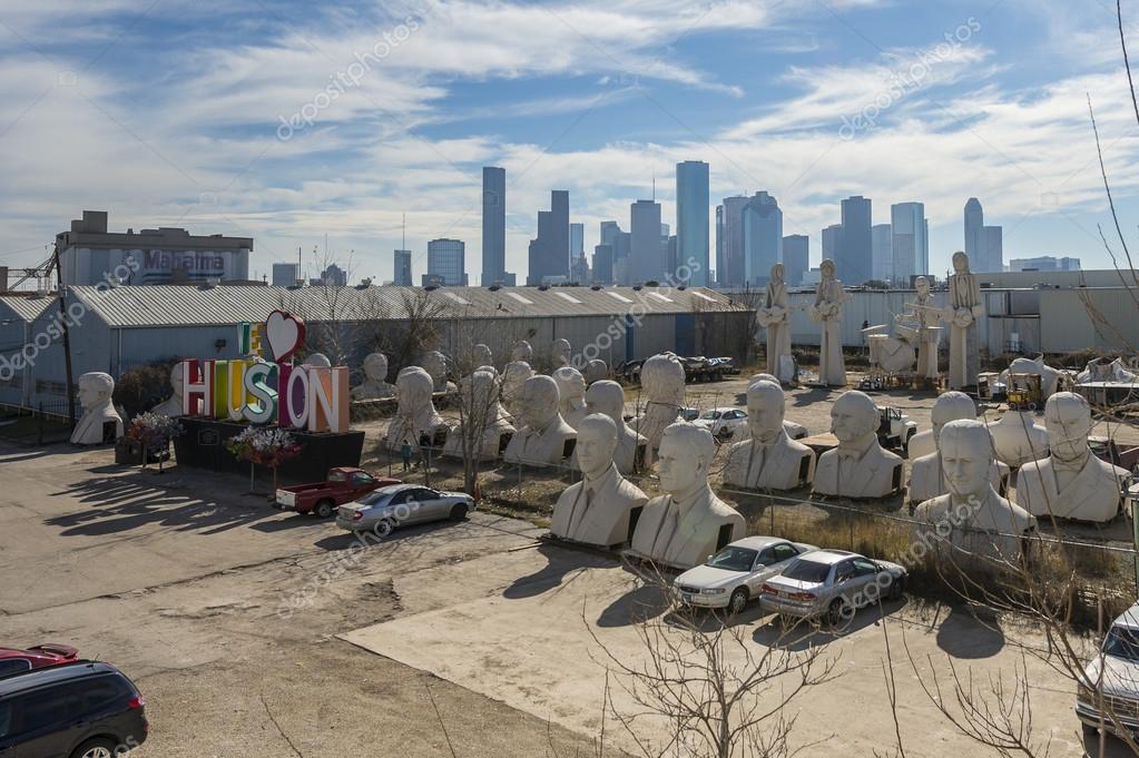Sculptures of David Adickes over the urban landscape of Houston city