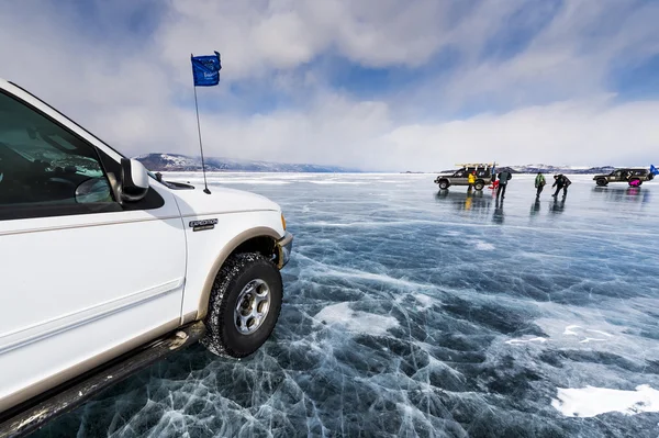 SUV truck on winter Baikal lake — Stock Photo, Image