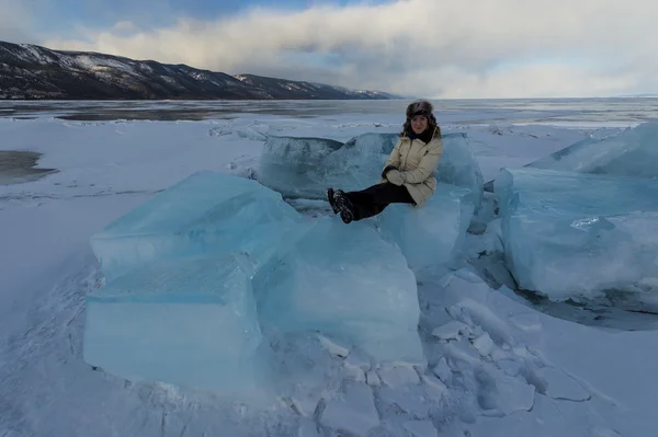 Happy woman among endless Baikal ices — Stock Photo, Image