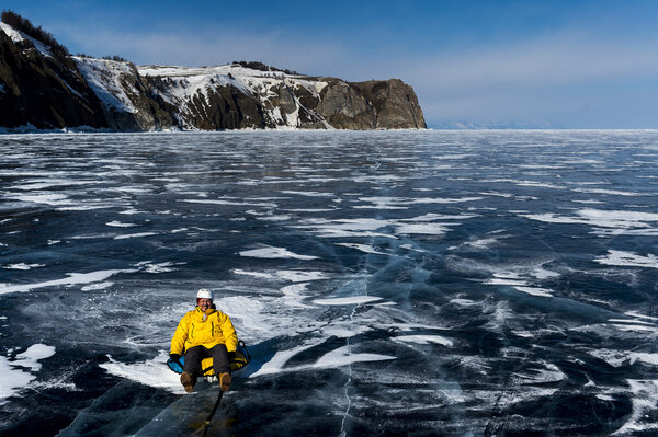 Tube riding on frozen Baikal lake, Russia