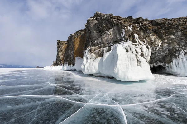 Rocks and ice of baikal lake, Russia Stock Image