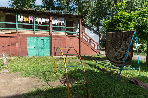 Typical yard in a little russian town — Stock Photo, Image