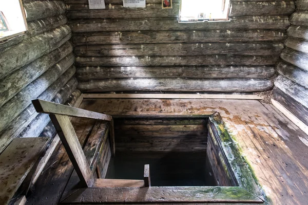 Entrance into the wooden cellar iside russian house — Stock Photo, Image