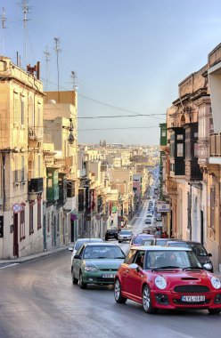 Sliema, Malta old city central street at sunny day clipart