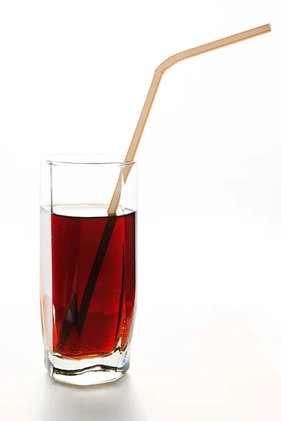 Refreshing drink in a glass with straw for cocktails — Stock Photo, Image