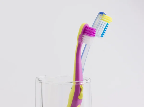 Big and small toothbrushes — Stock Photo, Image