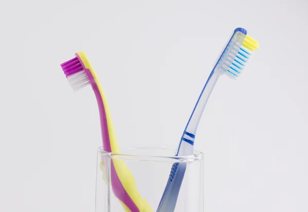 Big and small toothbrushes — Stock Photo, Image
